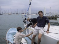 Adam applies the bow number - notice how green Greg looks (rough night!)
